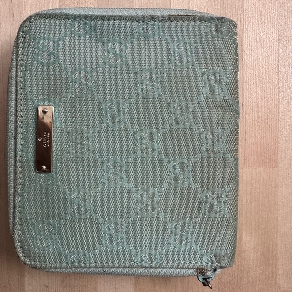 Gucci unique compact wallet in light blue with gold intertwined - Picture 1 of 1